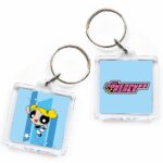 niebieski brelok z motywem bajki atomówki. motyw bajki