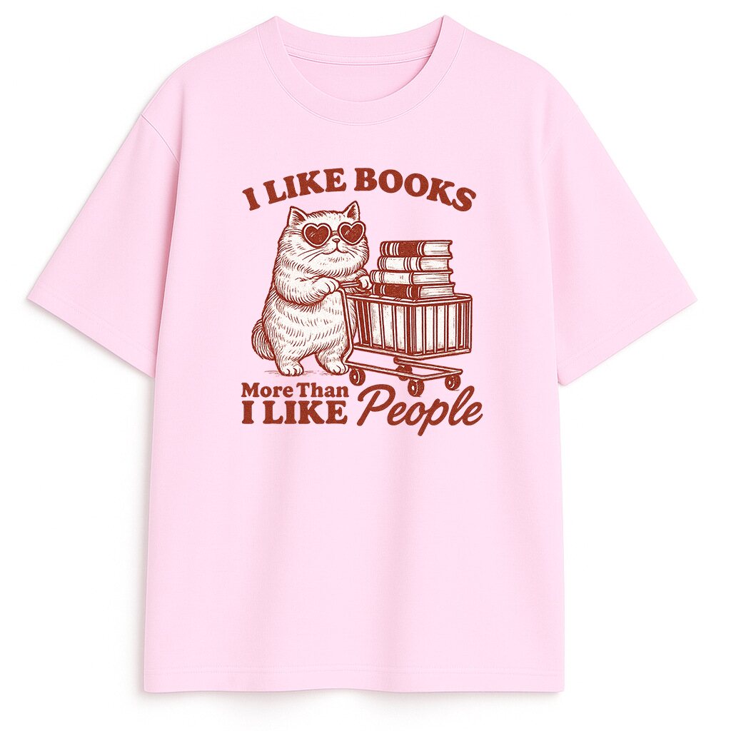 Różowy wariant - pastelowy klimat Różowy t-shirt z kotem dla miłośników czytania - subtelny klimat vintage i zabawny przekaz o miłości do książek